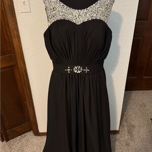 Elegant Black Evening Gown with Embellished Neckline